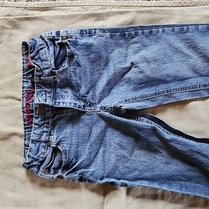 Youth riding jeans
